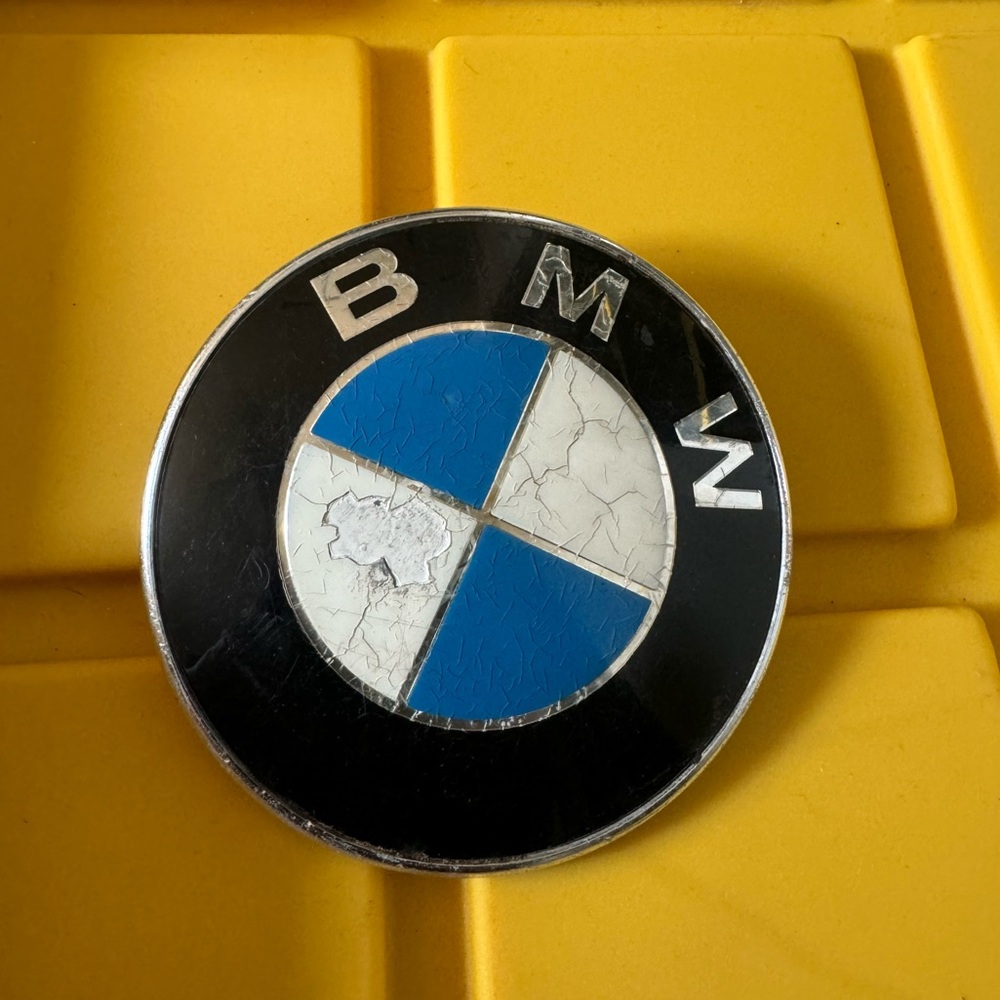 BMW hood emblem.